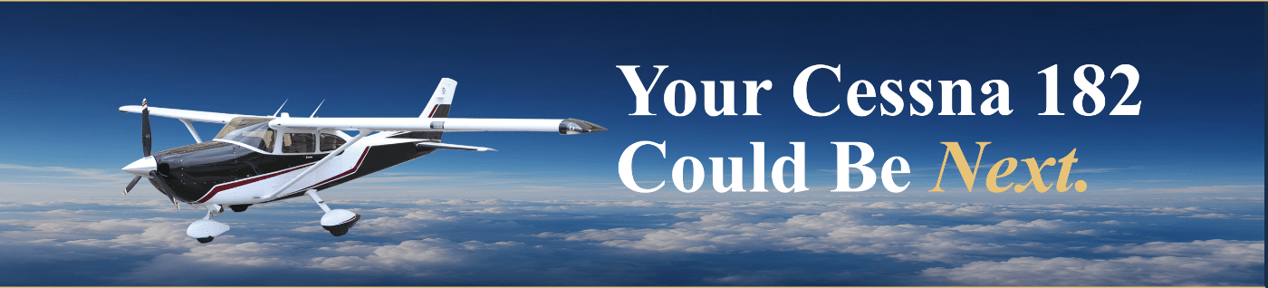 Cessna 182 flying above the clouds