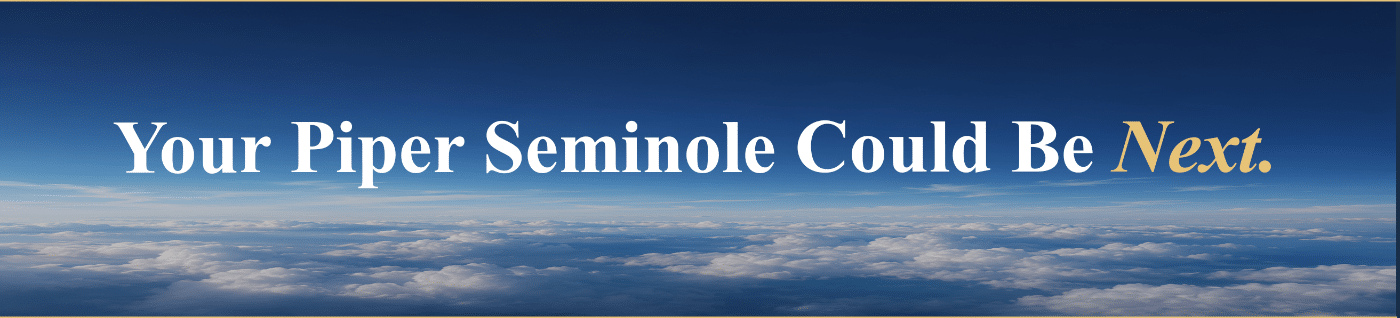 Piper Seminole flying above the clouds